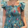 Robe Longue Mira - aux manches courtes smockée. Couleur bleu 3