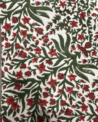 Nappe Ravika, une nappe ronde de 150 cm. Une nappe aux imprimés floraux rouge et vert.